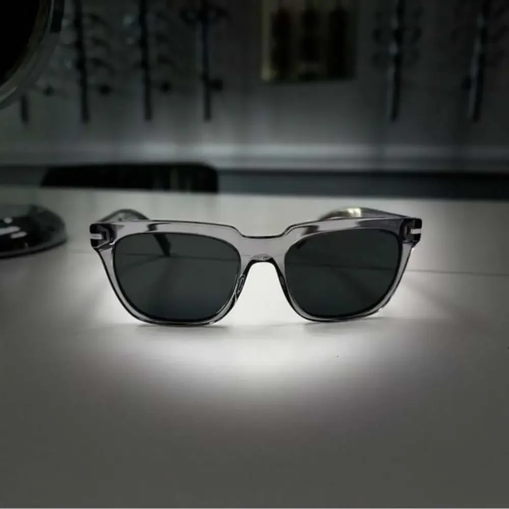 Stylish Prada translucent grey poalarized sunglasses